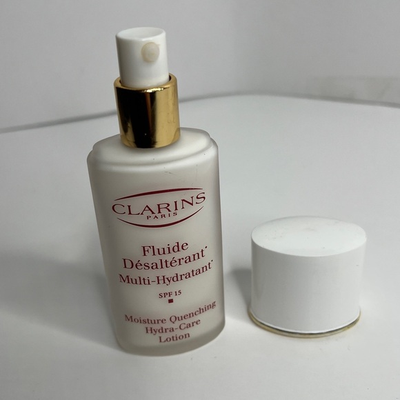 Clarins Fluide Désaltérant Multi-Hydratant SPF 15 Moisture Hydra Care Lotion - Picture 4 of 4